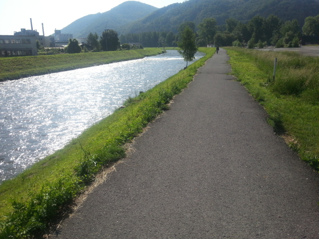 Asphalt road besides river Hron